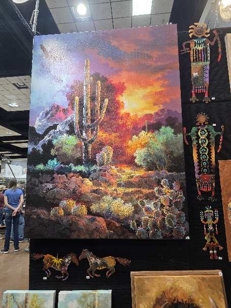 Large Southwestern desert landscape painting featuring saguaro cactus displayed at the Ruidoso Art & Wine Festival.