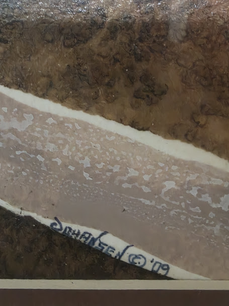 Artist's signature and date on the edge of an original painting.