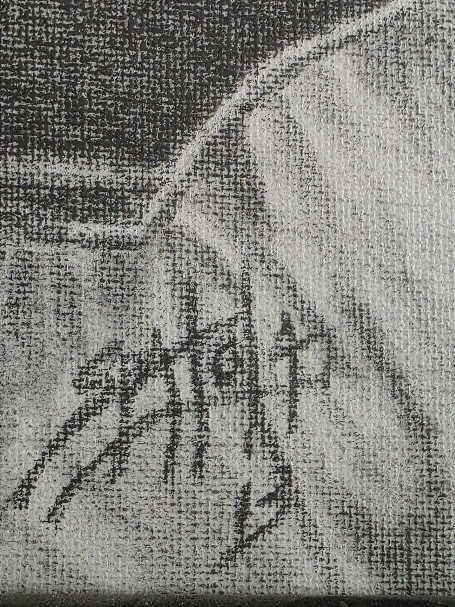 Charcoal signature on a limited edition print by the artist.